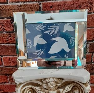 Beveled mirror frame